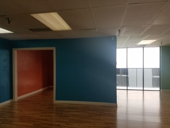 PRIVATE OFFICE AND LARGE OPEN AREA, SEVERAL USES.